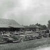 Early hall photo with old cars